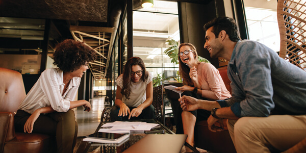 Group collaborating on their project in a collaboration zone